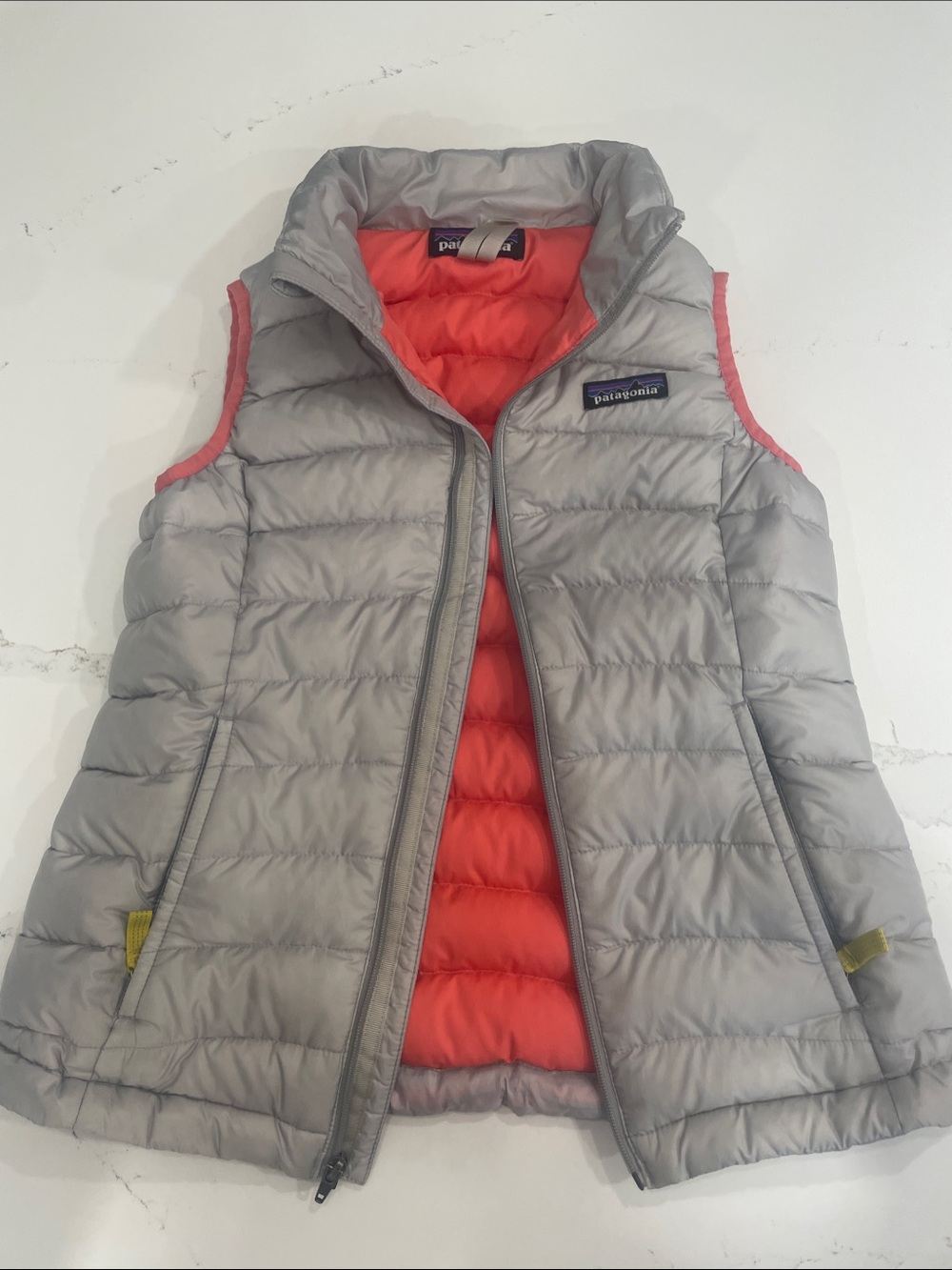 Patagonia Kids Puffer Vest in Light Gray with Coral Interior